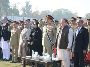 Prime Minister Muhammad Nawaz Sharif, COAS Gen Raheel Sharif, Governor and CM KPK, senior civil and military officials  standing in respect of the national anthem during a ceremony at Army Public School in Peshawar on Wednesday.