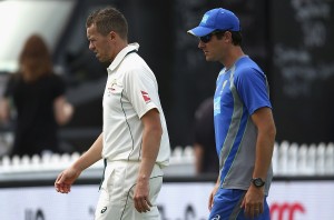 WELLINGTON, NEW ZEALAND - FEBRUARY 15: Peter Siddle of Australia looks on with Australian Team Physiotherapist David Beakley during day four of the Test match between New Zealand and Australia at Basin Reserve on February 15, 2016 in Wellington, New Zealand.  (Photo by Ryan Pierse/Getty Images)