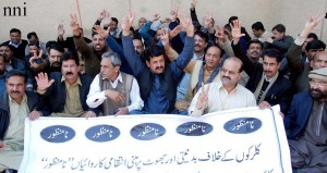 Workers of APCA staging a protest sit-in in favour of their demands in Rawalpindi on Wednesday. - NNI