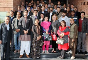 Atif Ikram President ICCI and Shakeel Anjum President National Press Club Islamabad pose for a group phot0 during visit of NPC office bearers to Chamber House in Islamabad on Tuesday. 