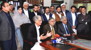 CM KP Pervez Khattak, Federal Minister Mohammad Ishaq Dar and Khwaja Mohammad Asif talking to media after signing agreement regarding  resolution of KP issues with Federal Government in Islamabad on Thursday.