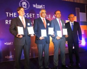 Minister of State for Privatisation, Mohammad Zubair pose for a photo after receiving the ASSET Best Deal of the year award-2015 in Hong Kong on Monday. 