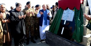 Prime Minister Muhammad Nawaz Sharif, COAS Gen Raheel Sharif, CM Balochistan and others praying after the inauguration of Hoshab-Gwadar (M-8) road on Wednesday.