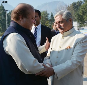 AJK President Sardar Muhammad Yaqub Khan welcoming Prime Minister Muhammad Nawaz Sharif at the helipad in Muzaffarabad on Friday.