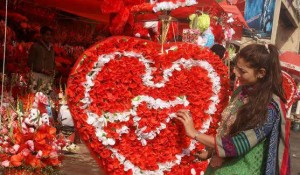 A girl selecting a gift regarding Valentine Day in Islamabad. - SABAH
