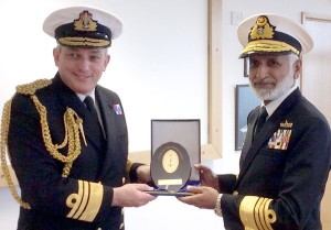 Fleet Commander of Royal Navy Vice Admiral Sir Philip Jones presenting a gift to Chief of the Naval Staff Admiral Muhammad Zakaullah at Fleet Headquarters in United Kingdom  on Tuesday. - DNA
