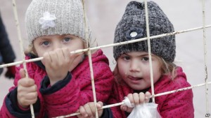 Syrian children wait to return to their country at the Turkish border crossing with Syria in the outskirts of Kilis, southeastern Turkey, Feb. 11, 2016.