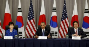  U.S. President Barack Obama with South Korean President Park Geun-Hye (Left) and Japanese Prime Minister Shinzo Abe (Right) at the Nuclear Security Summit in Washington on Thursday. 