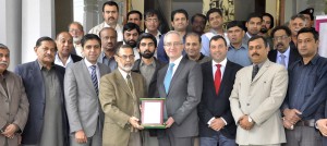 RCCI President presenting a memento to Spanish Envoy Carlos Morales during his visit to RCCI.