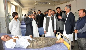 CM KP Pervez Khattak inquiring about the health of Peshawar blast victims at LRH on Wednesday.