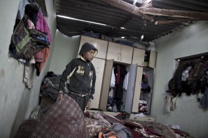  A Palestinian boy is looking at his home destroyed by the Israeli attack in Northern  Gaza strip in Palestine.
