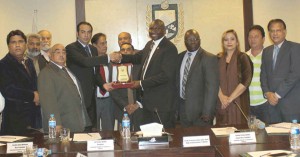 President ICCI, Atif Ikram Sheikh presenting a shield to Prof. Julius Kibet, High Commissioner of Kenya during his visit to Chamber House on Monday. - DNA