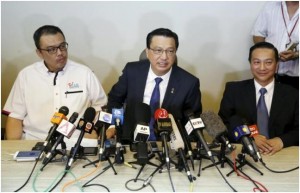 Malaysian Transport Minister, Liow Tiong Lai (Centre) addressing a news conference about debris found on a beach in Mozambique that may be from missing Malaysian Airlines flight MH370 in Kuala Lumpur on Thursday.