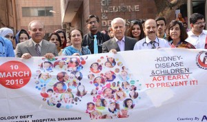 Staffers of Fatima Memorial Hospital take out a walk to spread awareness regarding kidney problems as the world celebrates International Kidney Day in Lahore on Thursday.-DNA