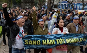 Activists are chanting anti-China slogans during a rally marking anniversary of 1988 war in Hanoi, Vietnam.-AFP