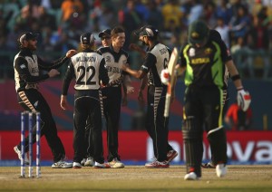 DHARAMSALA, INDIA - MARCH 18: Mitchell Santner of New Zealand celebrates after taking the wicket of Steve Smith of Australia during the ICC World Twenty20 India 2016 Super 10s Group 2 match between Australia and New Zealand at HPCA Stadium on March 18, 2016 in Dharamsala, India. (Photo by Ryan Pierse/Getty Images,)