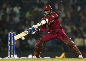 West Indies batsman Marlon Samuels plays a shot during the World T20 cricket tournament match between South Africa and West Indies at The Vidarbha Cricket Association Stadium in Nagpur on March 25, 2016. / AFP / PUNIT PARANJPE        (Photo credit should read PUNIT PARANJPE/AFP/Getty Images)