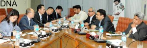 Dr. Miftah Ismail, MOS/Chairman Board of Investment in a meeting with Wang hui, Asst General Marketing Sinosure and Zhou, Deputy Financial Officer, Norinco International in Islamabad. - DNA