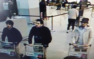 A young man in a hat caught on CCTV pushing a luggage trolley at Belgium's Zaventem airport alongside two others who, investigators said, had later blown themselves up in the terminal.    REUTERS/Belgian Federal Police