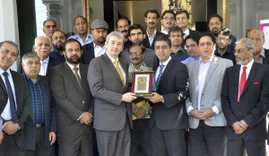 Vice President RCCI presenting a shield to Ambassador of Belgium during  his visit to RCCI on Tuesday.-DNA