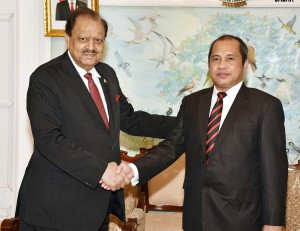 President Mamnoon Hussain being received by Minister of Villages, Disadvantaged Regions & Transmigration Marwan Jafar upon his arrival at Halim Airport Jakarta in Indonesia on Sunday.