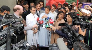  Chairman PTI, Imran Khan talking to media in Abbottabad on Tuesday. KPK Minister for Education Atif Khan and KPK Special Assistant to Cheif Minister on Information, Mushtaq Ahmad Ghani are also present.