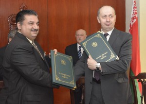 Federal Minister for Commerce Engr. Khurram Dastagir Khan and Minister for Industry Republic of Belarus Vitaly Vovk exchanging agreement at the concluding 2nd session of Joint Ministerial Commission in Lahore on Wednesday.