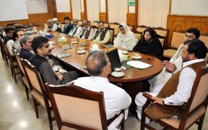 KPK Minister of Finance  Muzaffar Said talking to officers of Finance Dept. in Peshawar on Tuesday.