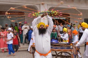 An Indian Sikh demonstrates 'Gatka' martial arts skills during a procession to mark 'Hola Mohalla' at The Golden Temple in Amritsar.-AFP 