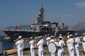 The Philippines Navy band playing music during a reception held on the arrival of Japanese  destroyer J. S.  Ariake in Manila on Sunday.
