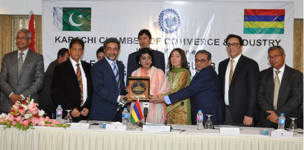  Chairman Businessmen Group &: Former President KCCI Sirai Kassam Teli, President KCCI Younus Muhammad Bashir and Advisor to CM Sindh Sharmila Farooqi presenting Chamber's crest to President of the Republic of Mauritius Dr. Ameenah Gurib'Fakim during her visit to Karachi. High Commissioner of Mauritius in Pakistan Yusuf Elahee, Honourary Consul General of Mauritius in Karachi Sohail Yasin Suleman, Secretary General of Mauritius Chamber of Commerce and Industry Mr. Raiujaddoo, President Mauritius-Pakistan Joint Business Council Shezad Ahmed and others are also seen in the picture.