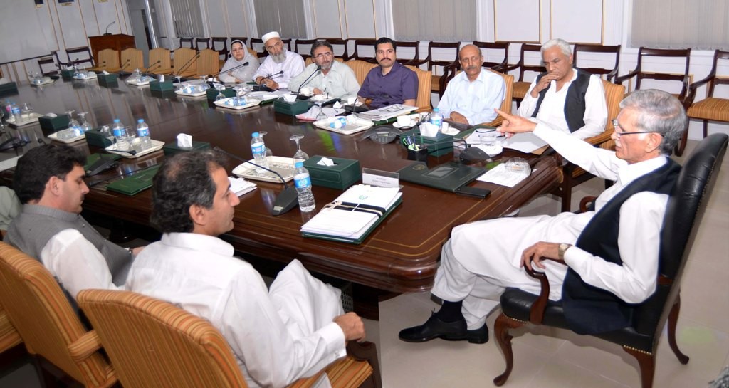 KPK Chief Minister Pervez Khattak presiding over a meeting regarding Land Computerisation Project in district Mardan at CM Secretariat in Peshawar on Wednesday.