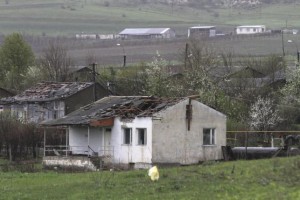 A view of a house damaged during clashes between Armenian and Azeri forces in the town of Martakert in Nagorno-Karabakh region on Sunday. 