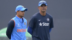 DHAKA, BANGLADESH - FEBRUARY 09: Ishan Kishan of India walks with coach Rahul Dravid of India after having a closer look at the pitch before the ICC U19 World Cup Semi-Final match between India and Sri Lanka on February 9, 2016 in Dhaka, Bangladesh. (Photo by Pal Pillai/Getty Images for Nissan)