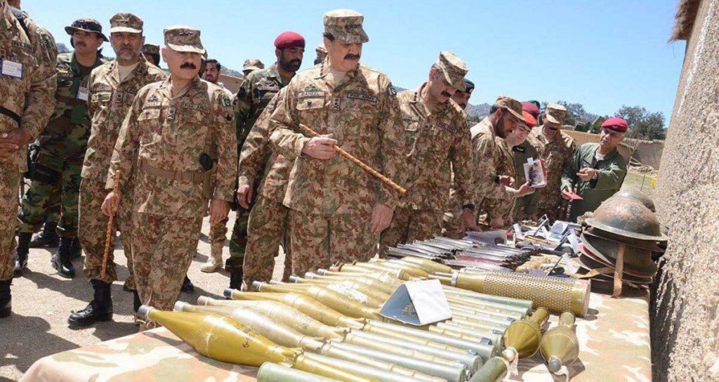 COAS Gen Raheel Sharif inspecting the weapons recovered during Shawal Operation in North Waziristan on Monday. - DNA