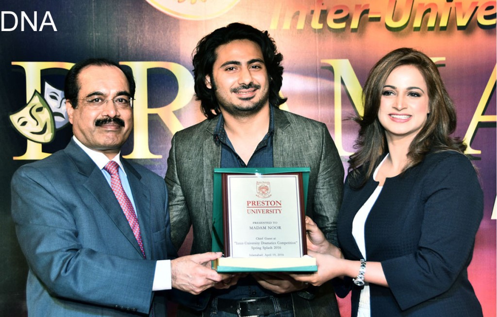 TV/Film Actress Noor receives a shield from Chancellor Perston University Dr. Abdul Basit on the occasion of Inter-University drama competion in Islamabad on Thursday.