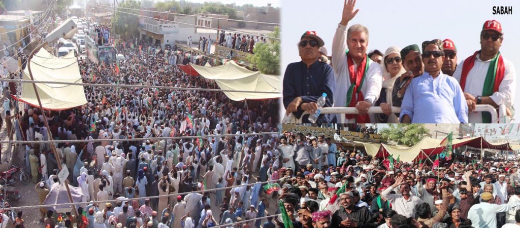 PTI Central Leader Shah Mehmood Qureshi replying to the slogans of people by waving his hand  in Pannu Aqil on Saturday.