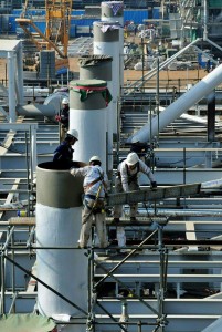 Chinese workers are collecting parts at a coastal oil drilling  platform of the country. -AFP 