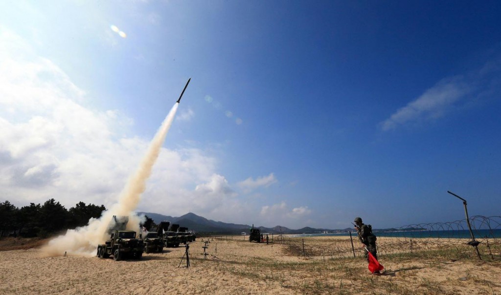 South Koeran Army’s 130 MM Multi Purpose Rocket Launchers are being fired during exercises in the  eastern coastal area of the country.-AFP