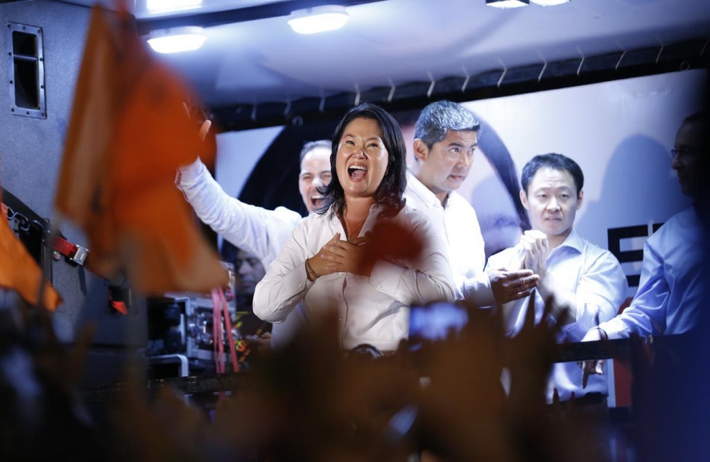 Presidential Candidate of Centre-Right Party, Keiko Fujimori is replying to slogans of her fans after  a press conferece in Lima, Peru.-AFP 
