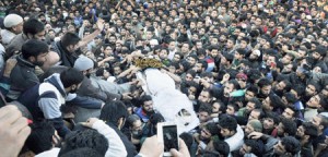 SRINAGAR, INDIA - OCTOBER 29: Kashmiri villagers carry the body of top Lashkar-e-Taiba commander Abu Qasim during his funeral procession on October 29, 2015 in Bugam district Kulgam some 75 km from Srinagar, India. Police on Thursday claimed that the most wanted LeT Commander Abu Qasim was killed during an encounter in Khandaypora area of Kulgam district, south Kashmir. (Photo by Waseem Andrabi/Hindustan Times via Getty Images)