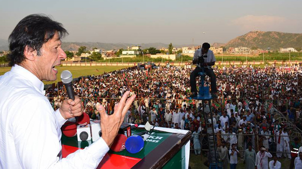 Chaiman PTI Imran Khan addressing a public gathering in Bhimber, AJK on Thursday. - DNA