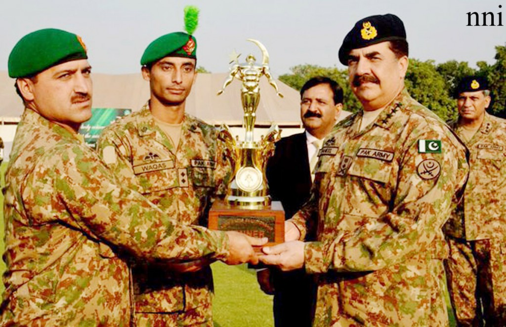 COAS Gen Raheel Sharif awarding trophy to the winner of 5th PACES (Physical Agility and Combat Efficiency System) Championship-2016 at Ayub Stadium in Lahore on Friday. - DNA