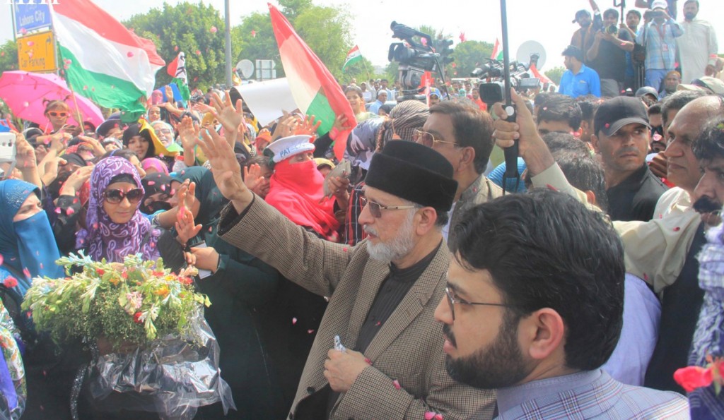 Pakistan Awami Tehrik Chairman waving hand to supporters at Lahore  airport on return home from abroad. 