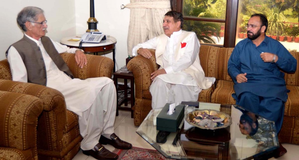 CM KPK Pervez Khattak talking to Ex-Governor Lt. G (R) Iftekhar Hussain Shah who called on him at CM House in Peshawar on Wednesday.