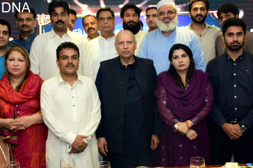 PTI leader Ch Sarwar with MPA Saeed Sohail Rana and others at an Iftar dinner hosted by Rana Taqaser in Lahore on Monday. - DNA