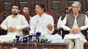Chairman PTI Imran Khan along with CM KPK Pervez Khattak addressing a press conference  in Peshawar on Sunday. - DNA
