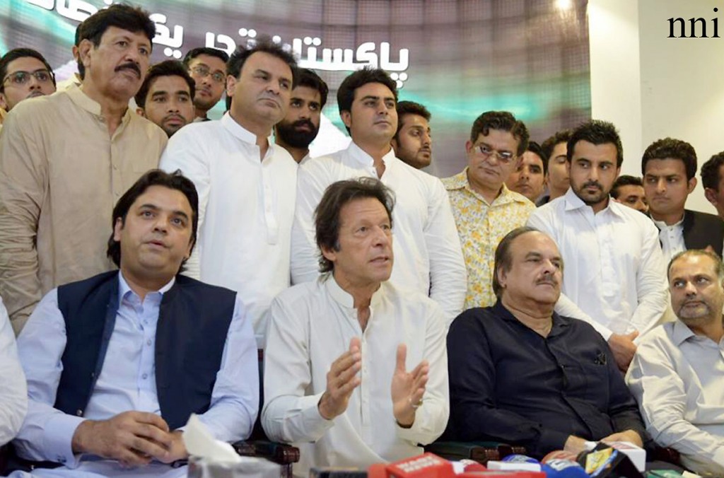 Chairmn PTI Imran Khan talking to media in Sialkot on Friday. -NNI