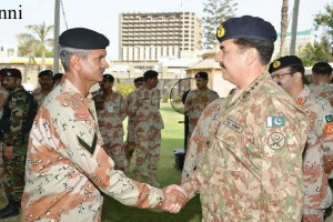 COAS Gen Raheel Sharif shaking hand with an officer during his visit to  HQs Pakistan Rangers Sindh in Karachi on Sunday. - NNI