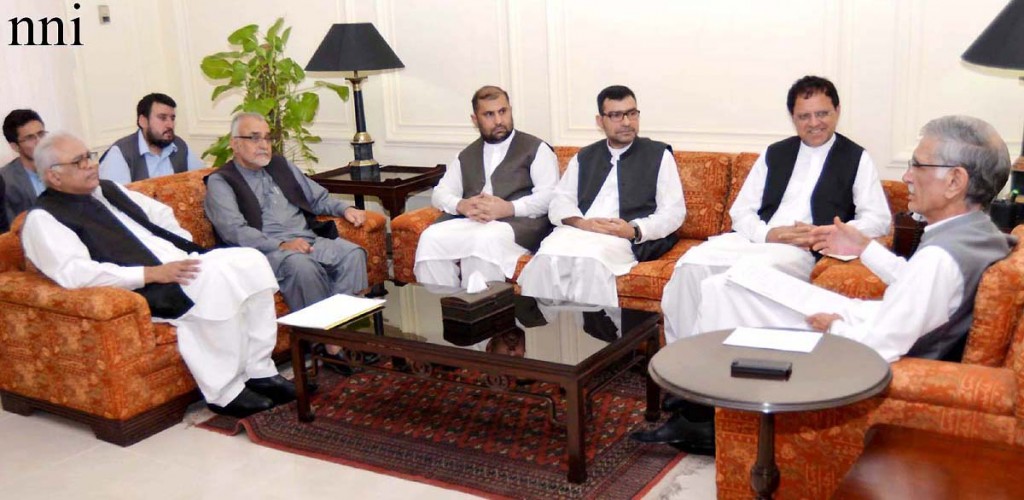 CM KPK Pervez Khattak talking to a delegation of Afghanistan led by Ambassador Dr. Umar Zakhelwal at CM House in Peshawar on Thursday. - NNI